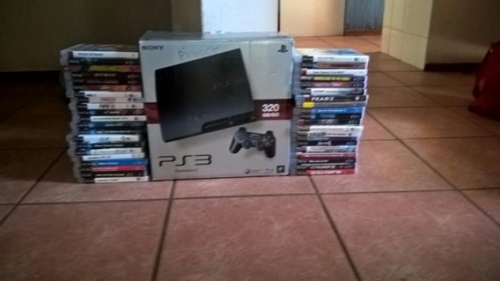 PS3 Console, 3xremotes,docking station and 40Games