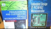 Four technical books in good condition, including Pic demo board and i