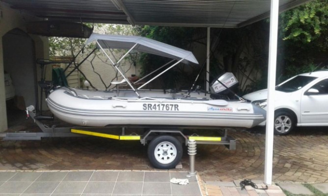 Inflatable Bass boat on breakneck trailer with 15hp Selva Marine motor